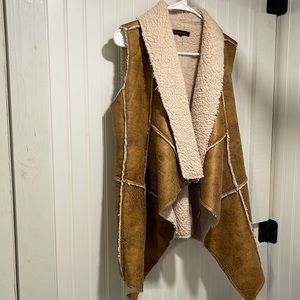Faux leather/sherpa vest